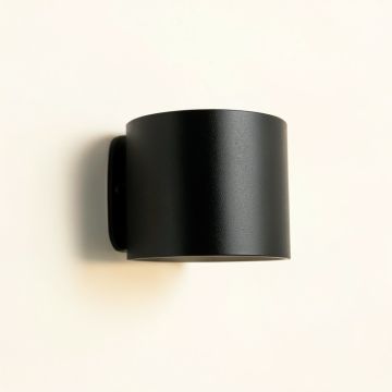 Slate Branch Wall Sconce Mounted On A Plain Wall - Black (synthetic illustration; no displayed measurements)
