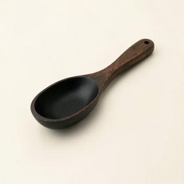 Clay Crossing Cooking Spoon - Black (synthetic illustration; no displayed measurements)