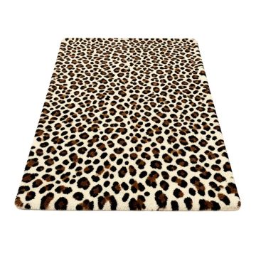 Penley Animal Print Tufted Brown/Black/Ivory Area Rug