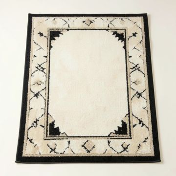 Tampico Hand-Tufted Wool Ivory/Black Area Rug (synthetic illustration; no displayed measurements)