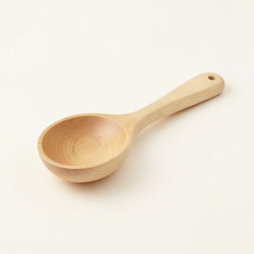 Holly Crossing Cooking Spoon - Ivory (synthetic illustration; no displayed measurements)