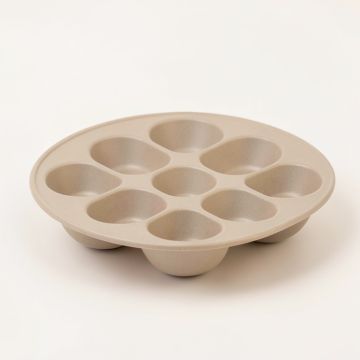 Ayesha Curry Bakeware 12 Cup Non-Stick Muffin Pan (synthetic illustration; no displayed measurements)