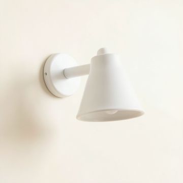 Ash Arc Wall Sconce Mounted On A Plain Wall (synthetic illustration; no displayed measurements)