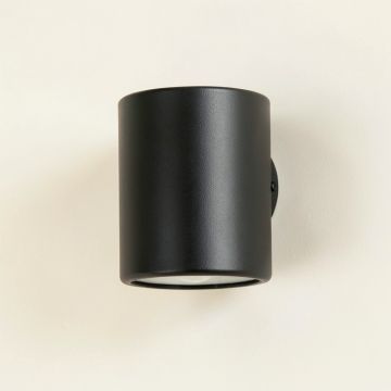Field Arc Wall Sconce Mounted On A Plain Wall (synthetic illustration; no displayed measurements)