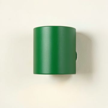 Laurel Brook Wall Sconce Mounted On A Plain Wall - Green (synthetic illustration; no displayed measurements)