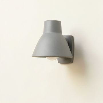 Glen Crossing Wall Sconce Mounted On A Plain Wall - Gray (synthetic illustration; no displayed measurements)