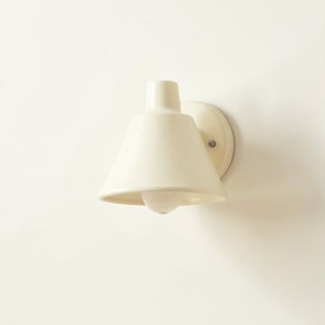 Juniper Brook Wall Sconce Mounted On A Plain Wall - Cream (synthetic illustration; no displayed measurements)