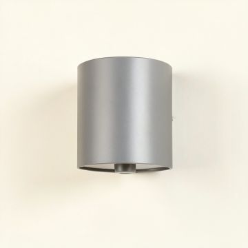 Vale Crossing Wall Sconce Mounted On A Plain Wall - Gray (synthetic illustration; no displayed measurements)