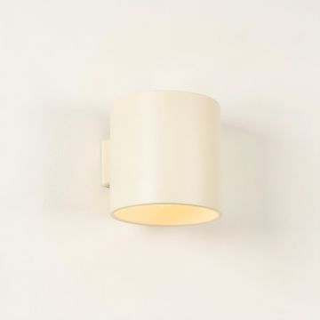 Stone Crest Wall Sconce Mounted On A Plain Wall - Ivory (synthetic illustration; no displayed measurements)