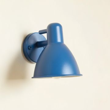 Flint Bluff Wall Sconce Mounted On A Plain Wall - Blue (synthetic illustration; no displayed measurements)