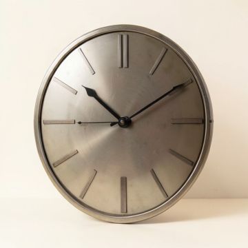 Oversized Bottrell 23.62 '' Wall Clock (synthetic illustration; no displayed measurements)