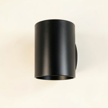 Slate Arc Wall Sconce Mounted On A Plain Wall - Black (synthetic illustration; no displayed measurements)
