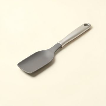 Nambé Curvo Bowl Scraper Spatula (synthetic illustration; no displayed measurements)