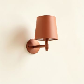 Cove Bluff Wall Sconce Mounted On A Plain Wall - Terracotta (synthetic illustration; no displayed measurements)