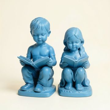 Braylen A Boy And A Girl Reading A Book 2 Piece Statue Set (synthetic illustration; no displayed measurements)