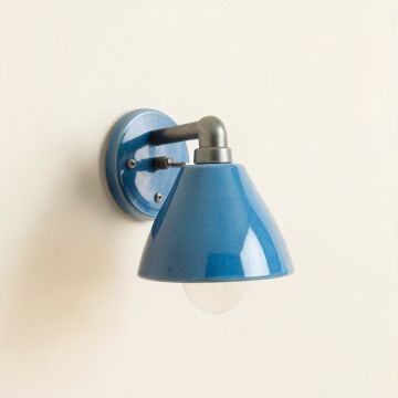 Field Crest Wall Sconce Mounted On A Plain Wall - Blue (synthetic illustration; no displayed measurements)