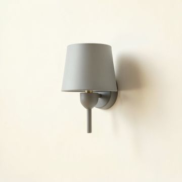 Stone Brook Wall Sconce Mounted On A Plain Wall - Gray (synthetic illustration; no displayed measurements)