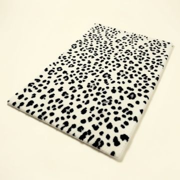 Contempo Animal Print Tufted Wool White/Black Area Rug (synthetic illustration; no displayed measurements)