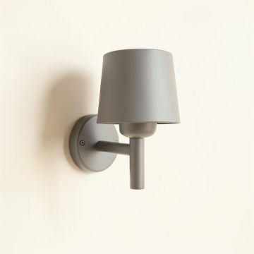Cliff Crest Wall Sconce Mounted On A Plain Wall - Gray (synthetic illustration; no displayed measurements)