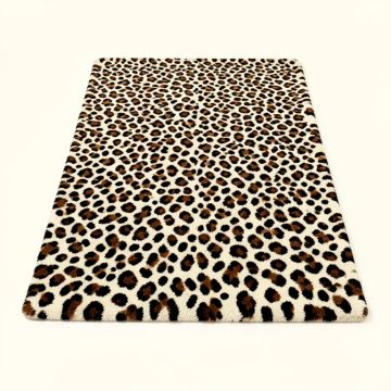 Penley Animal Print Tufted Brown/Black/Ivory Area Rug (synthetic illustration; no displayed measurements)