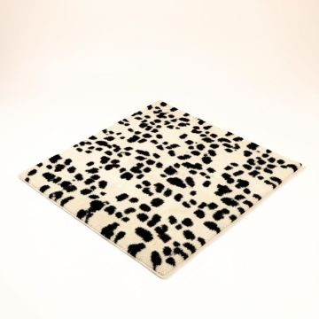 Ashley Animal Print Tufted Wool Ivory/Black Area Rug (synthetic illustration; no displayed measurements)