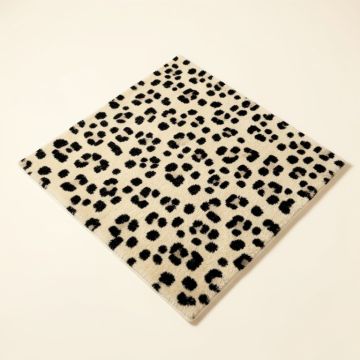 Lyly Animal Print Tufted Wool Beige/Black Area Rug (synthetic illustration; no displayed measurements)