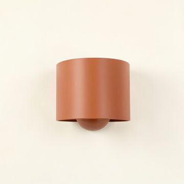 Juniper Bend Wall Sconce Mounted On A Plain Wall - Terracotta (synthetic illustration; no displayed measurements)