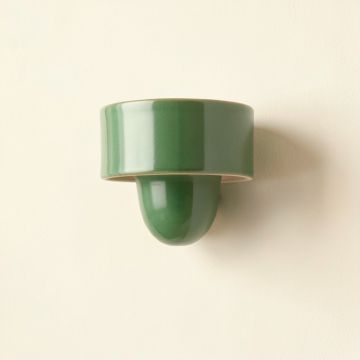 Spruce Dale Wall Sconce Mounted On A Plain Wall - Green (synthetic illustration; no displayed measurements)