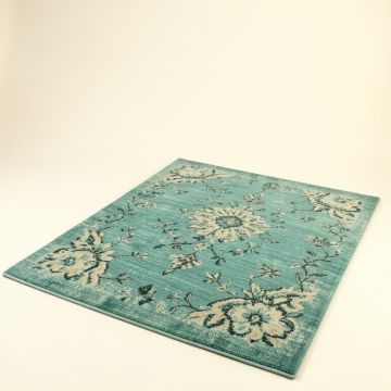 Leonora Bohemian Textured Weave Floral Indoor/Outdoor Teal Area Rug (synthetic illustration; no displayed measurements)