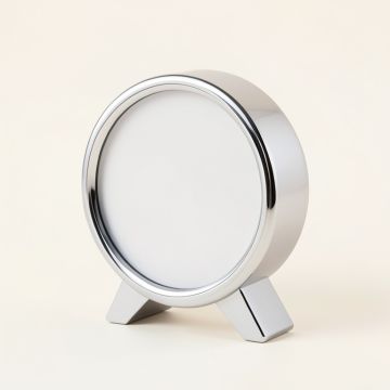 Chrome Clock And Thermometer (synthetic illustration; no displayed measurements)