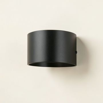 Dawn Bend Wall Sconce Mounted On A Plain Wall - Black (synthetic illustration; no displayed measurements)