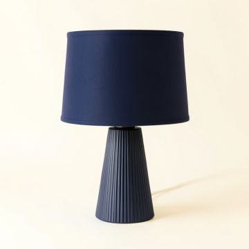 Clay Arc Table Lamp With A Plain Fabric Shade (synthetic illustration; no displayed measurements)