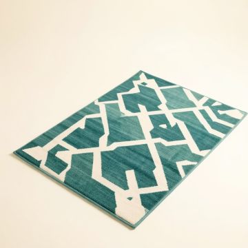 Geometric Teal/White Indoor/Outdoor Area Rug (synthetic illustration; no displayed measurements)