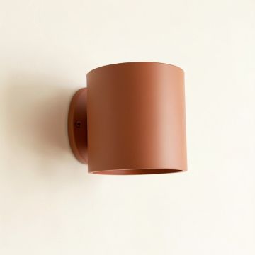 Wren Branch Wall Sconce Mounted On A Plain Wall - Terracotta (synthetic illustration; no displayed measurements)