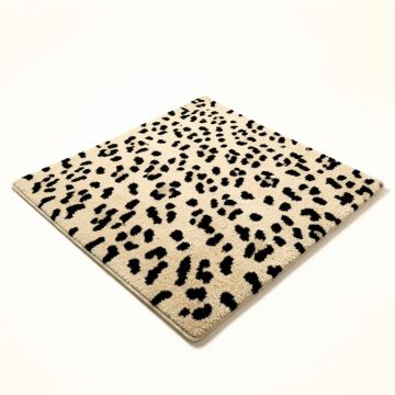 Grady Animal Print Tufted Wool Beige/Black Area Rug (synthetic illustration; no displayed measurements)