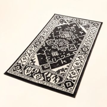 Rhodes Geometric Black/Charcoal/White Area Rug (synthetic illustration; no displayed measurements)