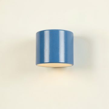 Pine Bluff Wall Sconce Mounted On A Plain Wall - Blue (synthetic illustration; no displayed measurements)