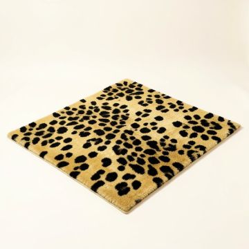 Thornbury Animal Print Tufted Wool Gold/Black Area Rug (synthetic illustration; no displayed measurements)