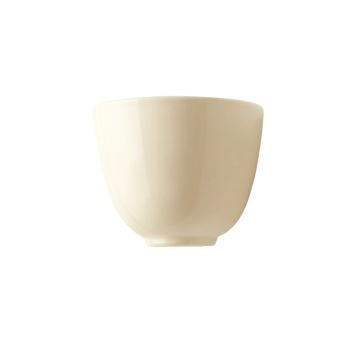 Dune Crest Wall Sconce Mounted On A Plain Wall - Cream