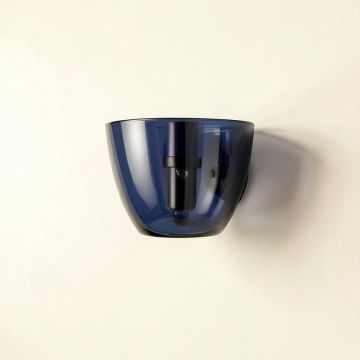 Juniper Arc Wall Sconce Mounted On A Plain Wall (synthetic illustration; no displayed measurements)
