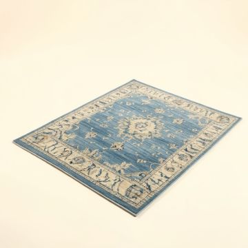 Elliott Ivory/Peacock Blue Area Rug (synthetic illustration; no displayed measurements)
