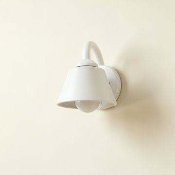 Olive Branch Wall Sconce Mounted On A Plain Wall - White (synthetic illustration; no displayed measurements)