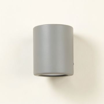 Spruce Canyon Wall Sconce Mounted On A Plain Wall - Gray (synthetic illustration; no displayed measurements)