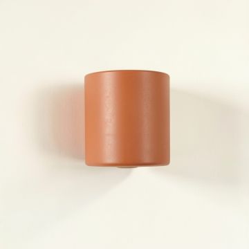 Summit Crest Wall Sconce Mounted On A Plain Wall - Terracotta (synthetic illustration; no displayed measurements)