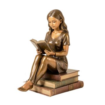 Girl Sitting On Books And Reading Statue