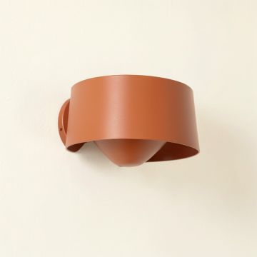 Cedar Brook Wall Sconce Mounted On A Plain Wall - Terracotta (synthetic illustration; no displayed measurements)