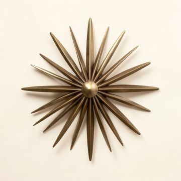 Starburst Wall Decor (synthetic illustration; no displayed measurements)