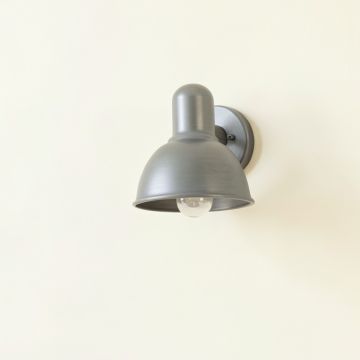 Shore Crest Wall Sconce Mounted On A Plain Wall - Gray (synthetic illustration; no displayed measurements)