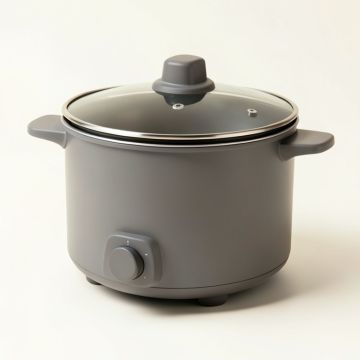 Nesco 1.5 Qt . Analog Slow Cooker (synthetic illustration; no displayed measurements)