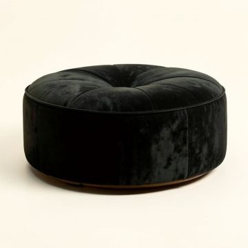 Huskins 41.73 '' Tufted Round Cocktail Ottoman (synthetic illustration; no displayed measurements)